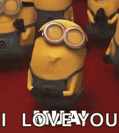 A Group Of Minions Are Standing Next To Each Other On A Red Carpet And One Of Them Is Wearing Goggles . GIF