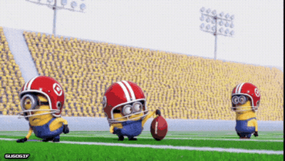 A Group Of Minions Wearing Football Helmets And Holding A Football GIF