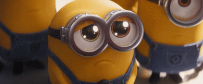 A Group Of Minions Wearing Goggles Are Looking At The Camera GIF