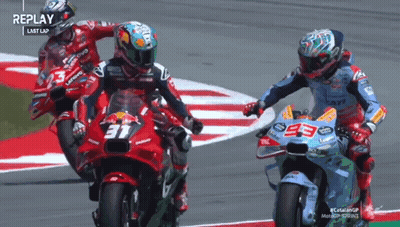 A Group Of Motorcycle Racers Are Racing On A Track With Replay Written On The Bottom GIF
