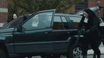 A Group Of Nuns Are Getting Into A Black Grand Cherokee GIF