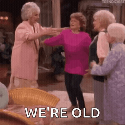 A Group Of Older Women Are Dancing Together In A Living Room While A Woman Says `` We 'Re Old '' . GIF