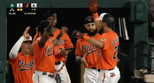 A Group Of Orioles Baseball Players Celebrate A Win GIF