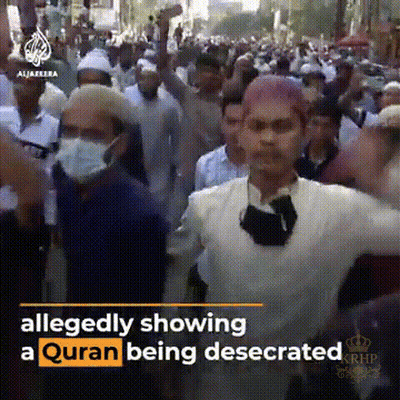 A Group Of People Are Allegedly Showing A Quran Being Desecated GIF