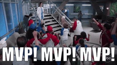 A Group Of People Are Celebrating With The Words Mvp ! Mvp ! Mvp ! Written Above Them GIF