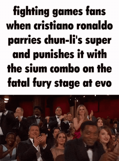 A Group Of People Are Clapping In A Theater And The Caption Says Fighting Games Fans When Cristiano Ronaldo GIF