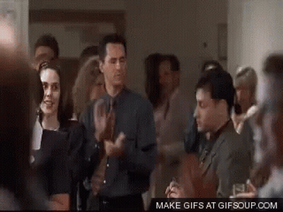 A Group Of People Are Clapping Their Hands In A Room With The Words Make Gifs At Gifsoup.com On The Bottom GIF