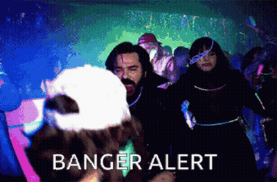 A Group Of People Are Dancing And Banger Alert Is Displayed On The Screen GIF