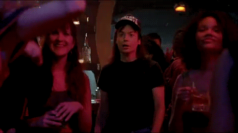 A Group Of People Are Dancing And The Word Schwing Is On The Bottom GIF