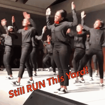 A Group Of People Are Dancing And The Words Still Run This Yard Are Visible GIF