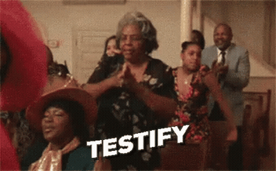 A Group Of People Are Dancing In A Church And The Word Testify Is On The Bottom Of The Image . GIF