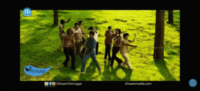 A Group Of People Are Dancing In A Field With A Pichuka Logo On The Bottom Left GIF