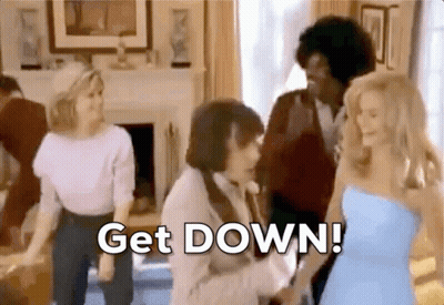 A Group Of People Are Dancing In A Living Room With The Words Get Down Written On The Screen GIF