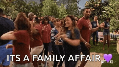 A Group Of People Are Dancing In A Park With The Words `` It 'S A Family Affair '' Written On The Screen . GIF