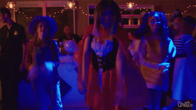 A Group Of People Are Dancing In A Room With The Words Brat Tv On The Bottom Right GIF