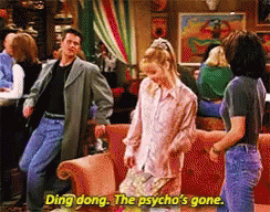A Group Of People Are Dancing In A Room With The Words " Ding Dong The Psycho 'S Gone " GIF