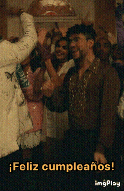 A Group Of People Are Dancing In A Room With The Words Feliz Cumpleanos In The Bottom Right Corner GIF