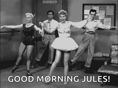 A Group Of People Are Dancing In A Room With The Words `` Good Morning Jules '' On The Bottom . GIF