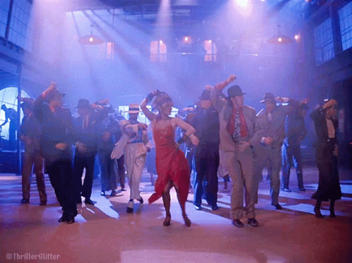 People Dancing In Room With Thriller Glitter GIF