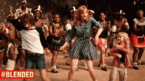 A Group Of People Are Dancing In Front Of A Crowd With The Words Blended In The Corner . GIF