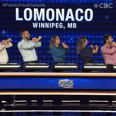 A Group Of People Are Dancing In Front Of A Sign That Says Lomonaco GIF