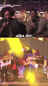 A Group Of People Are Dancing In Front Of A Sign That Says Los Angeles On It GIF
