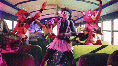 A Group Of People Are Dancing On A Bus And One Of Them Is Wearing A Teddy Bear Costume GIF