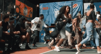 A Group Of People Are Dancing On A Court In Front Of A Pepsi Banner . GIF