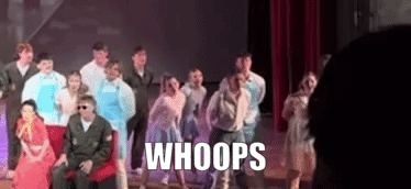 A Group Of People Are Dancing On A Stage And The Word Whoops Is Written On The Bottom Of The Image . GIF
