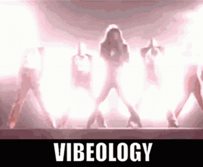A Group Of People Are Dancing On A Stage With The Word Vibeology Written On The Bottom GIF