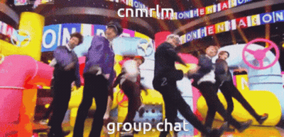 A Group Of People Are Dancing On A Stage With The Words Group Chat In The Lower Right Corner GIF