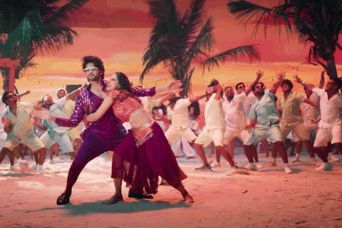 People Dancing On The Beach GIF