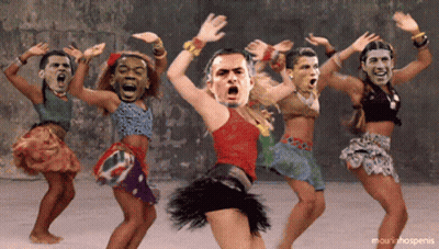 A Group Of People Are Dancing With Their Faces On Their Heads And The Caption Mourinhospenis GIF