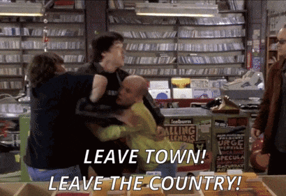 A Group Of People Are Fighting In A Store With The Words " Leave Town Leave The Country " Written On The Bottom GIF