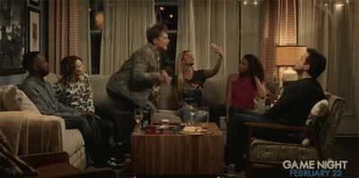 A Group Of People Are Gathered In A Living Room With The Date February 23 GIF