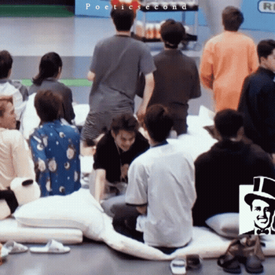 A Group Of People Are Gathered In A Room With The Words Poetic Second On The Bottom Left GIF