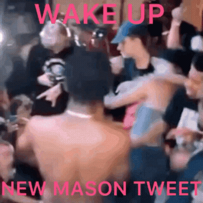 A Group Of People Are Gathered In A Room With The Words Wake Up New Mason Tweet On The Bottom GIF