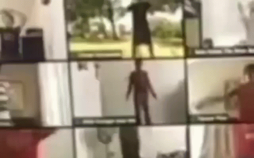 A Group Of People Are Having A Video Call With Their Shadows On The Wall . GIF