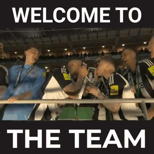 A Group Of People Are Holding Up A Trophy With The Words Welcome To The Team Below Them GIF