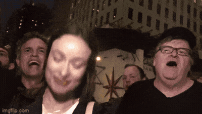 A Group Of People Are Laughing In Front Of A Building With Imgflip.com On The Bottom Right GIF