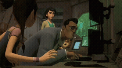 A Group Of People Are Looking At A Computer Screen With A Key On It GIF