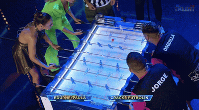 A Group Of People Are Playing A Game Of Cracks Futbolin GIF