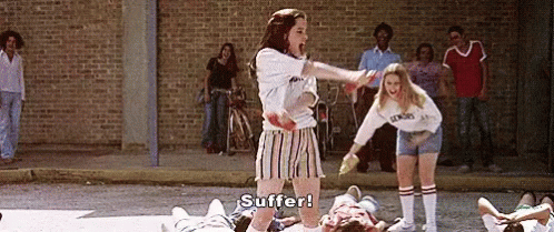 A Group Of People Are Playing A Game On The Sidewalk And One Of Them Is Screaming , `` Suffer ! '' GIF