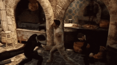 A Group Of People Are Playing A Video Game And One Man Is Naked GIF