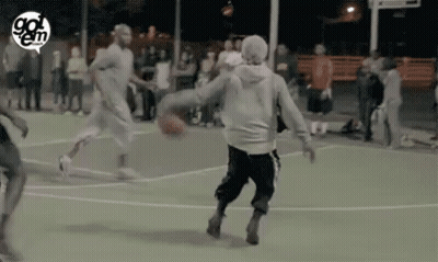 A Group Of People Are Playing Basketball On A Court With A Logo That Says Go Em GIF