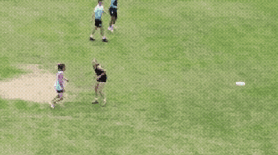 A Group Of People Are Playing Soccer On A Field GIF