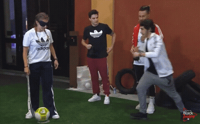 A Group Of People Are Playing With A Soccer Ball And One Of Them Is Wearing An Adidas Shirt GIF