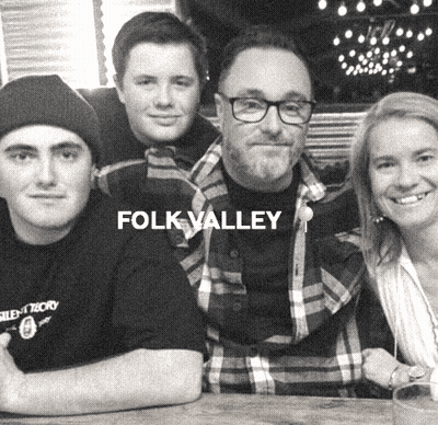 A Group Of People Are Posing For A Picture And The Words Folk Valley Are On The Bottom GIF