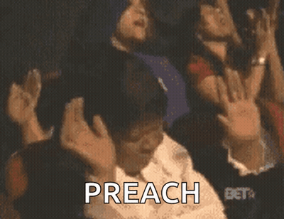 A Group Of People Are Raising Their Hands In The Air And The Word Preach Is On The Screen GIF