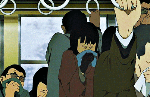 A Group Of People Are Riding A Bus And One Of Them Is Covering Her Mouth GIF